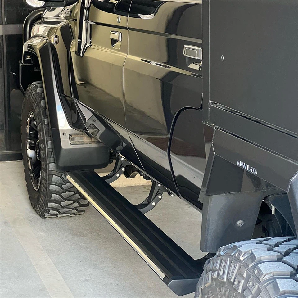 Power krok pro zvednuté nákladní automobily